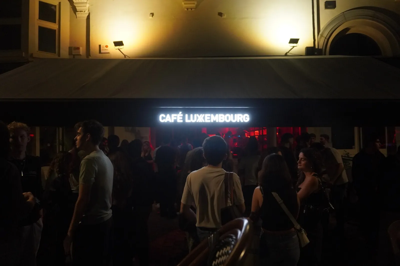 Guests gathered outside Café Luxembourg