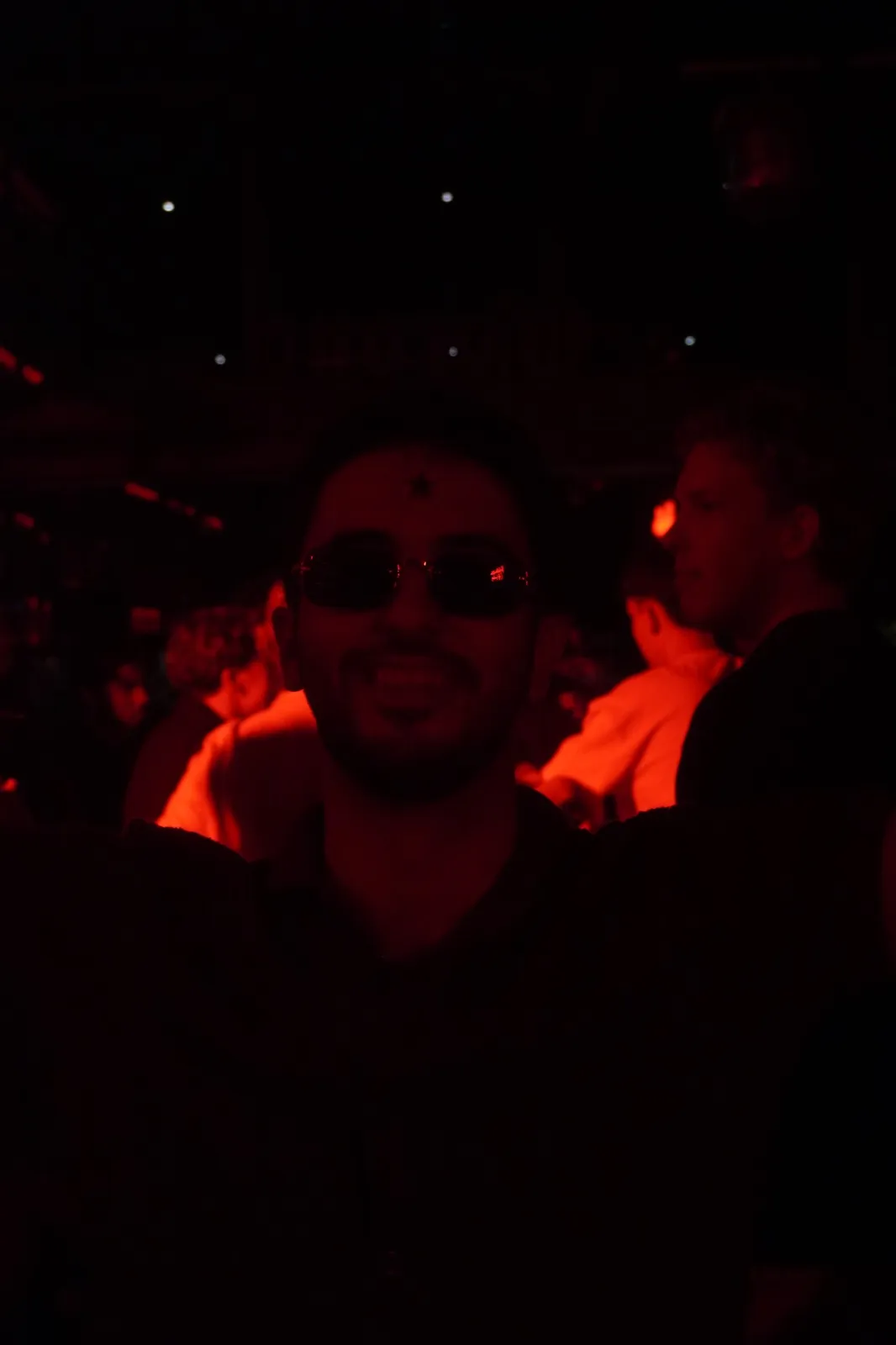 Portrait of a smiling guest in sunglasses