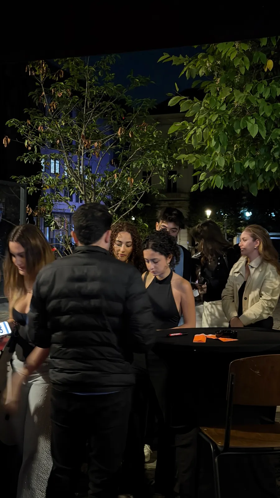 Guests checking in outside the event