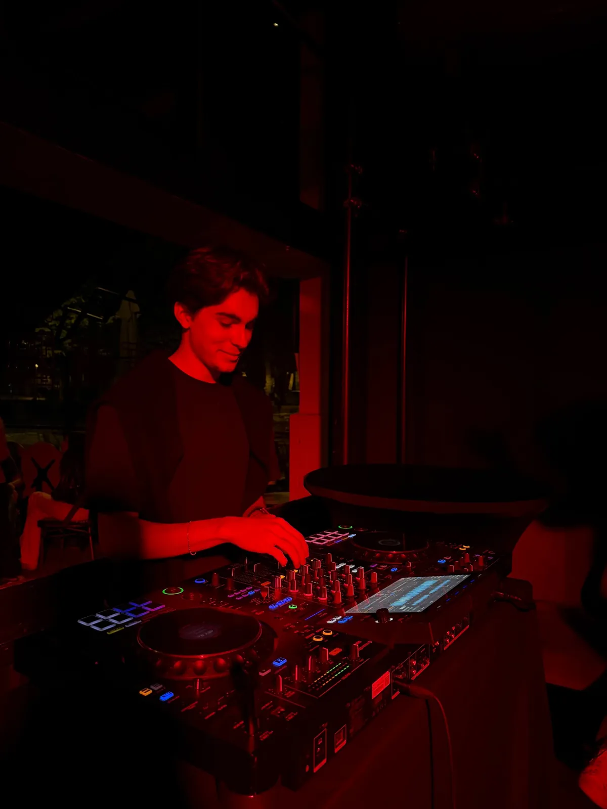 DJ focused on the mixer during DELETE:TUR